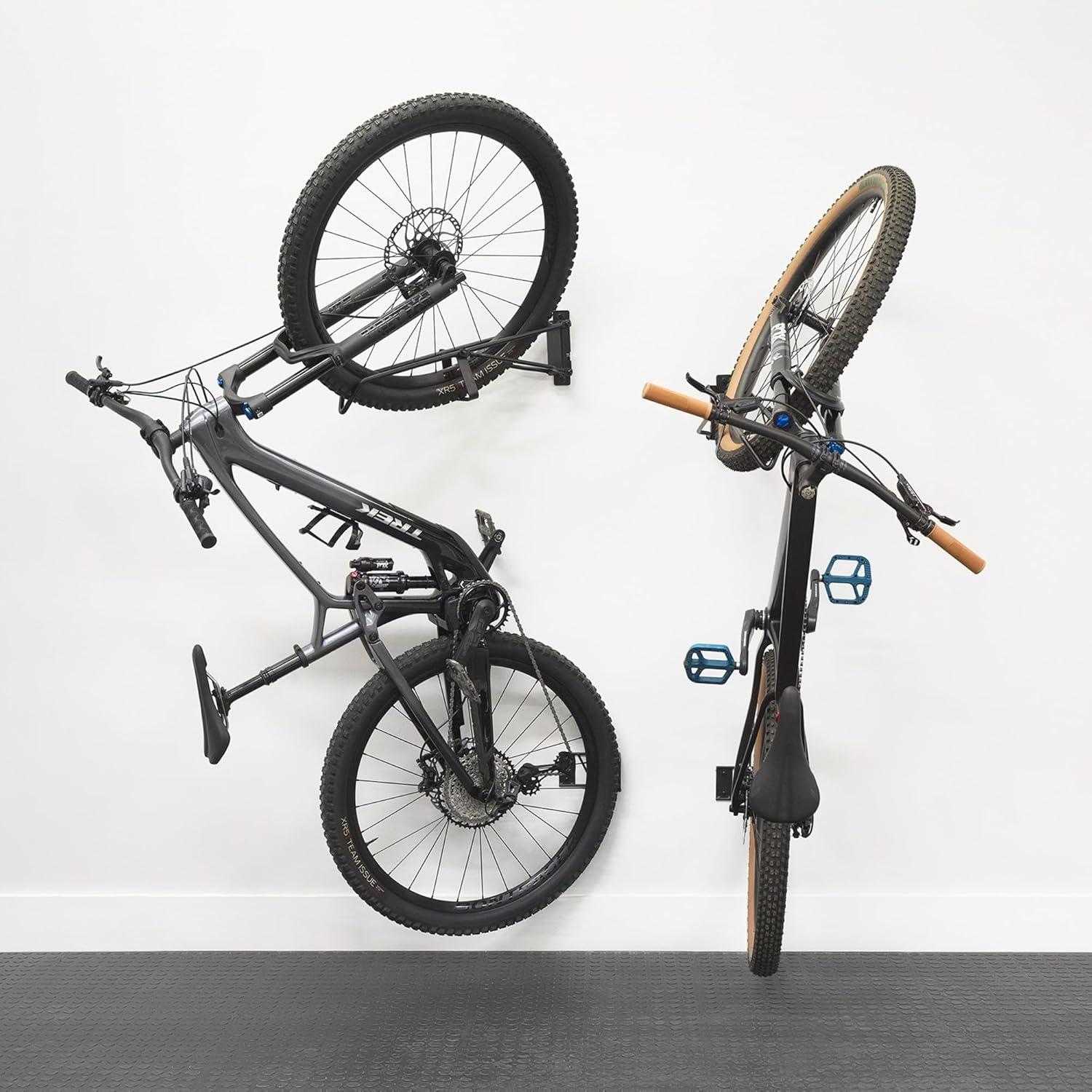 imageStoreYourBoard SwivelStow Road ampamp Gravel Bike Storage 2 Pack  Heavy Duty Bike Hanger NoLift Bike Wall Mount for Garage Bike Storage Holds 70 lbs PatentPending4 Pack