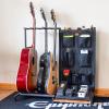 imageThe Headliner Guitar Rack 10 Storage Slots Multiple Guitar Floor Stand for Acoustic and Electric Gray Canvas Storage Pockets Hardwood ShelfBlack