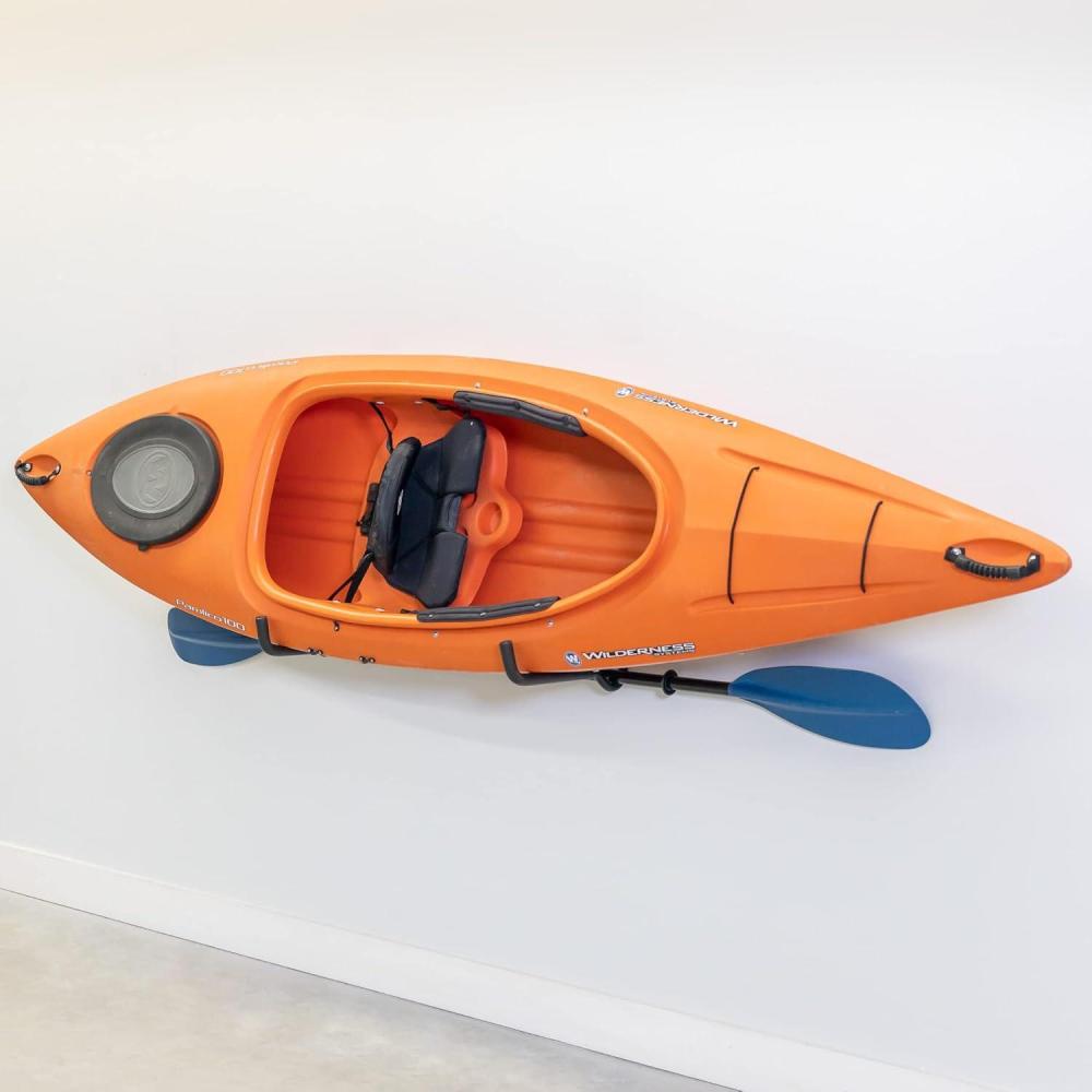 imageStoreYourBoard Roanoke Kayak Storage Rack Holds 100 lbs Kayak Wall Mount Hooks Kayak Rack for Garage Space Efficient Indoor Kayak Holder Solid Steel Protective PaddingStandard