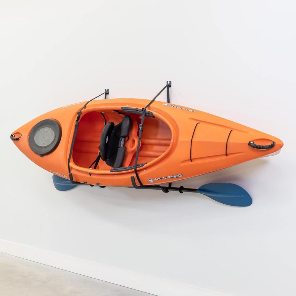 imageStoreYourBoard Roanoke Kayak Storage Rack Holds 100 lbs Kayak Wall Mount Hooks Kayak Rack for Garage Space Efficient Indoor Kayak Holder Solid Steel Protective PaddingPro